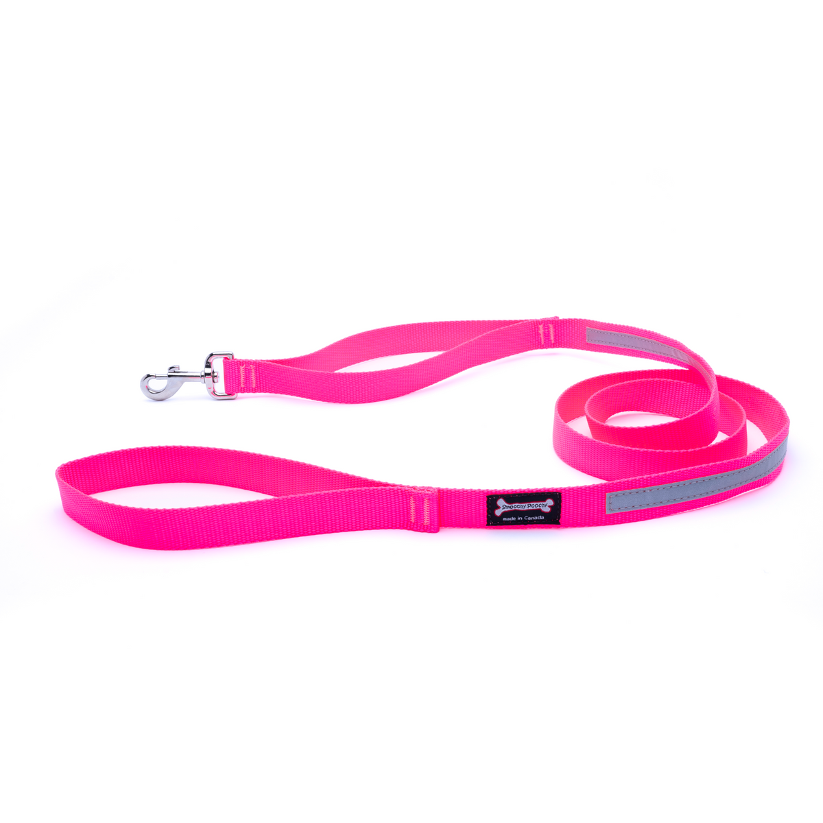 Hot Pink nylon dog leash coiled on a white background with a reflective safety strip, silver clasp