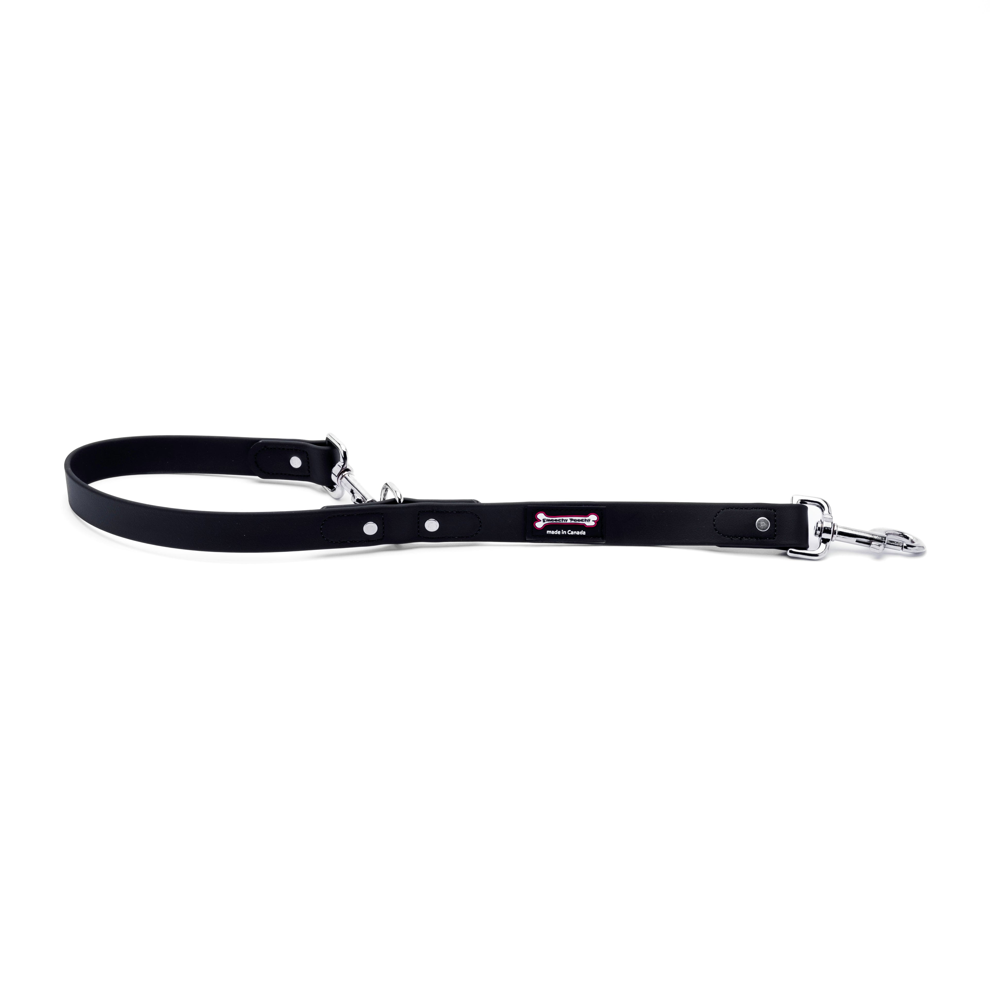 Black Biothane dog leash with two metal clasps and adjustable rivet loop