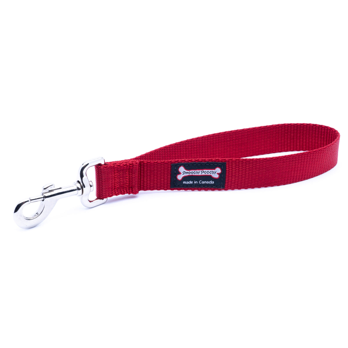 A red nylon dog leash with a silver metal snap hook clasp